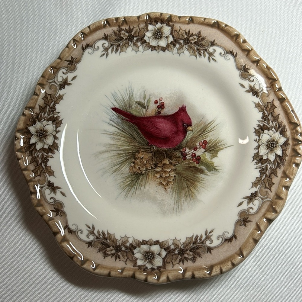 Cracker Barrel, small saucer. By Susan Winget. Beautiful design and NEW
